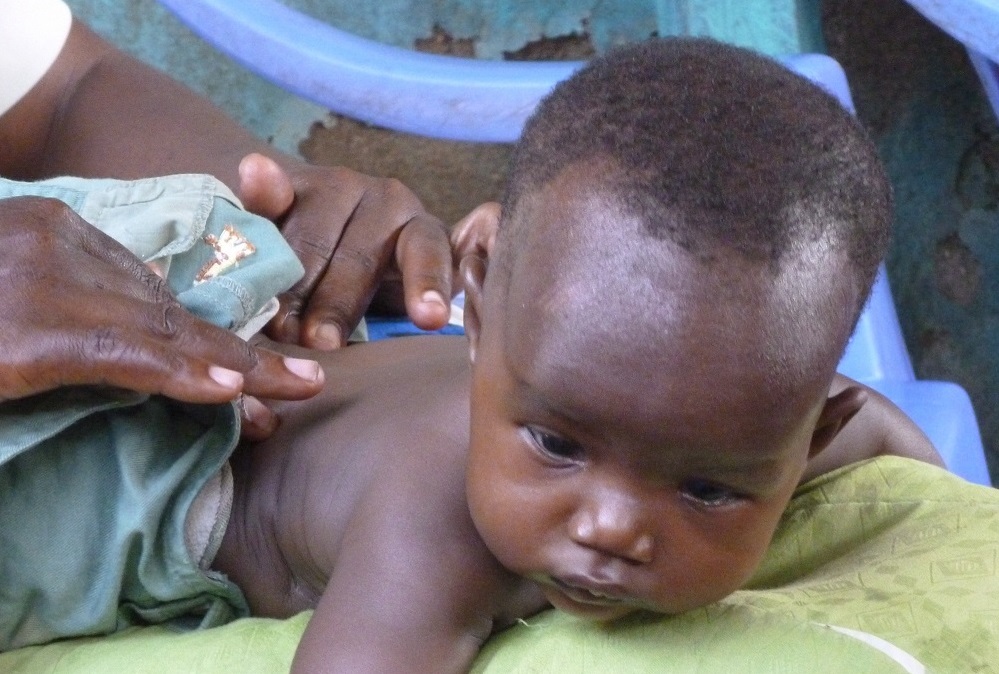 child being massaged